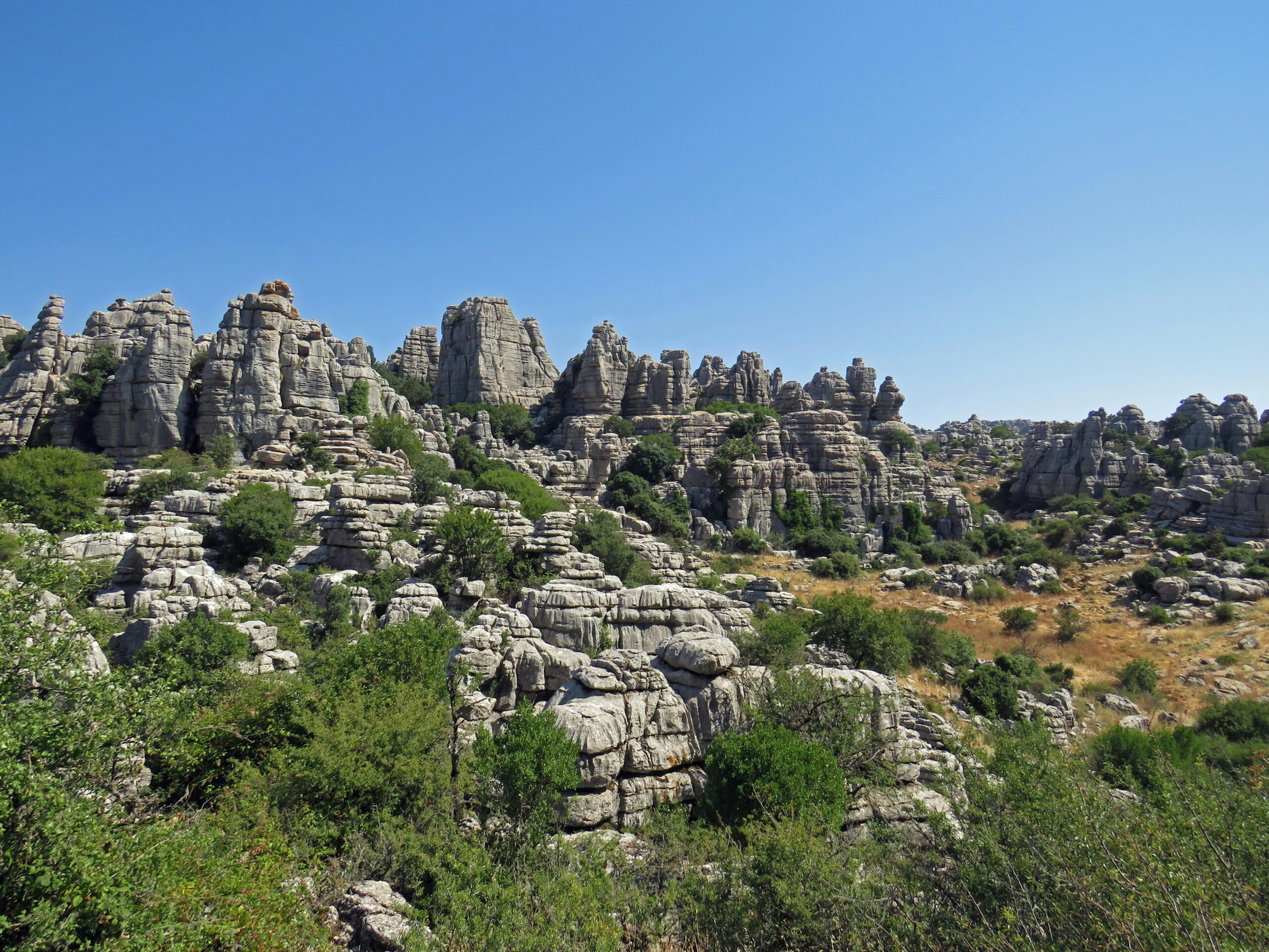 Explore the striking limestone rock formations of El Torcal de Antequera, Spain.